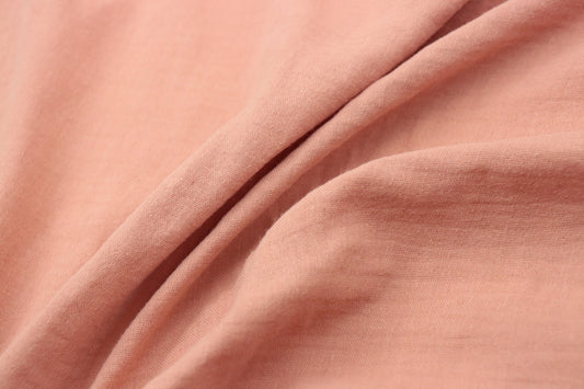 a close up view of a pink fabric