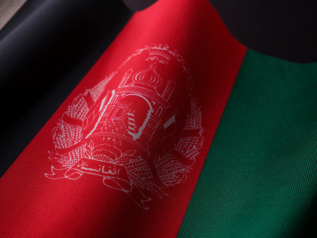 a close up of the flag of afghanistan