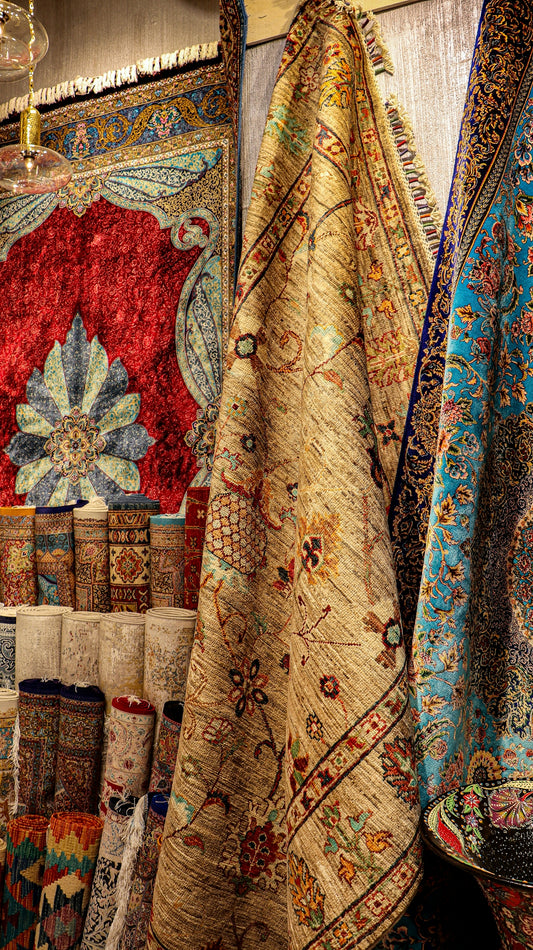 a display of rugs and rugs in a store